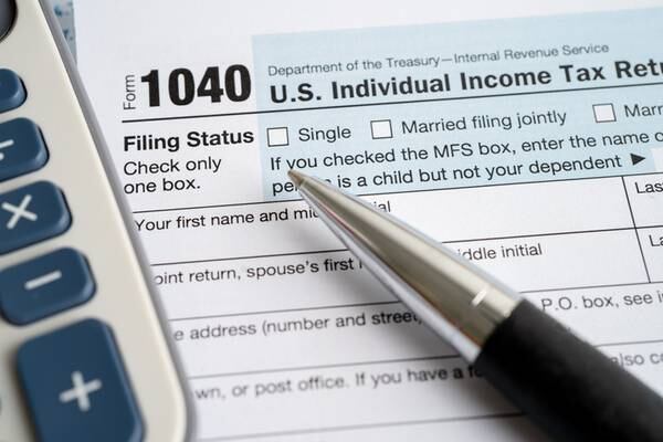 IRS tells millions to hold off on filing income tax returns
