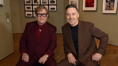 Elton John, notable photography collector, says it's "painful" having his own photo taken