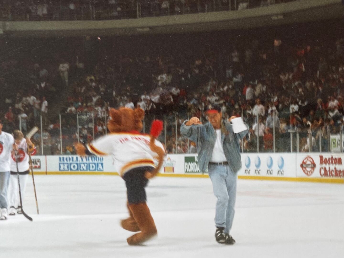 Bobby Mitchell hosts the Panthers' Million Dollar Slapshot on the ice at the Miami Arena, 1993-94