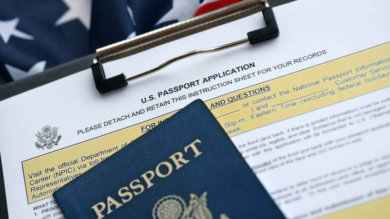 Department of State form DS11 Application for a U.S. Passport lies on table and ready to fill close up. Paperwork during operations with US Passport concept